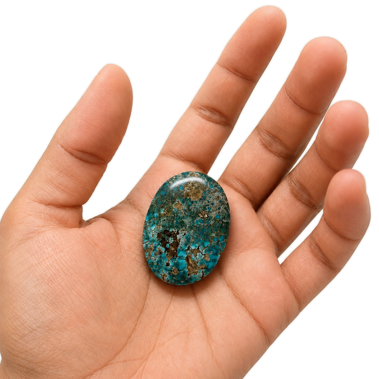 NEYFI 1006 natural Neyshabur turquoise held in hand for scale